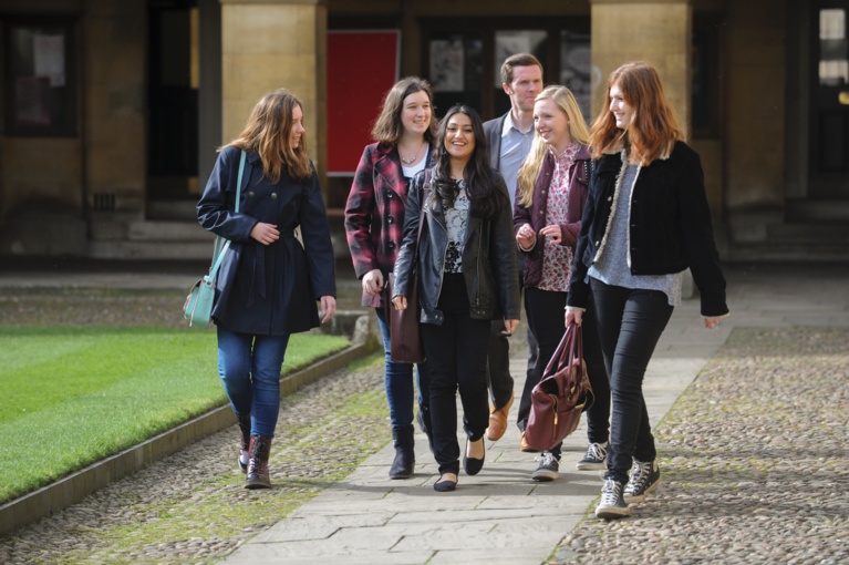 Group of students walking across Front Court