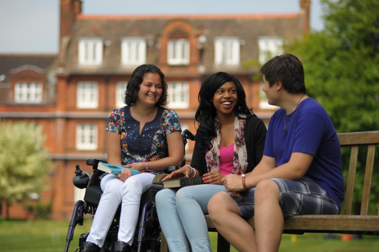 Students on a bench in the Paddock