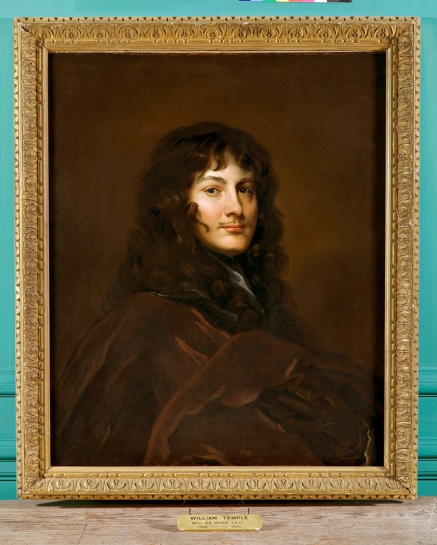 A portrait of a man with long curly brown hair and a brown jacket, half facing the painter